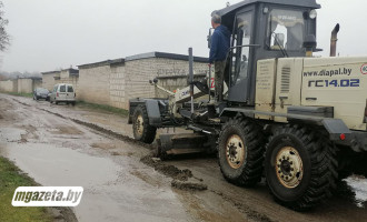 Не лужи, а следы ноября, или Осенний марафон коммунальщиков